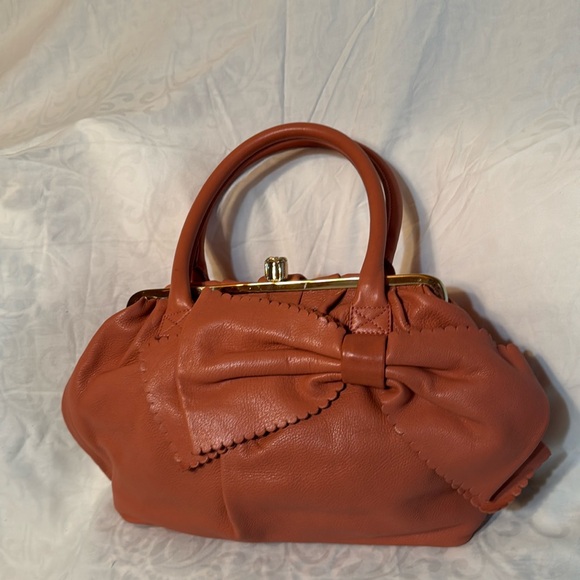 RED Valentino in pink with kisslock shoulder bag - Picture 1 of 5